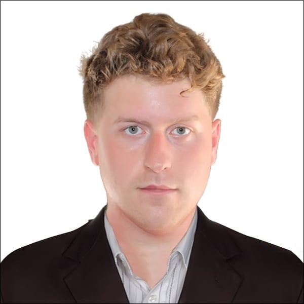 Professional headshot portrait of Christopher Sumner, Co-Founder and CEO of NexoFlow